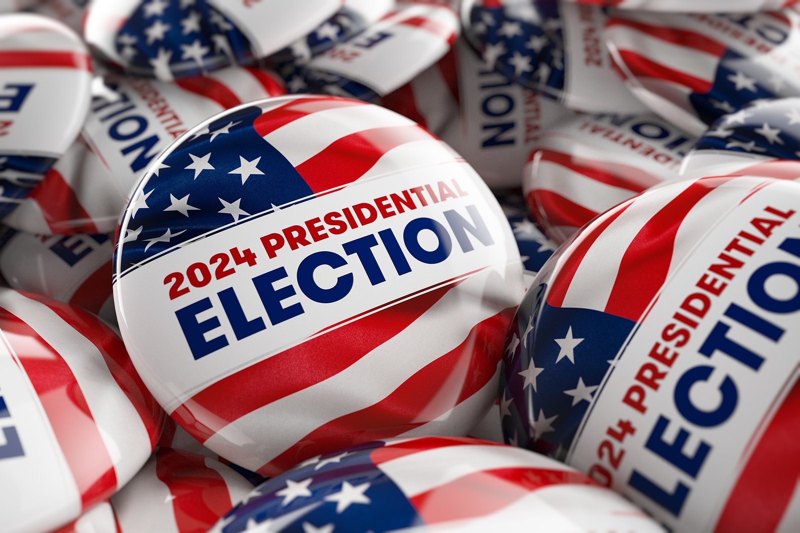 Closeup shot of one presidential election 2024 button in focus in between many other buttons in a box. Selective focus with shallow depth of field. 3D illustration.