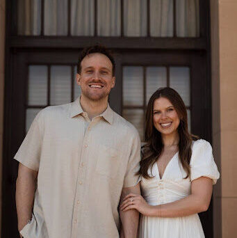 Kevin and his wife taking a photo together